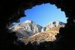 Kalymnos -  The dip in the crags seen through the remains of the old church on the hill above Emborios is the location of the Kastri