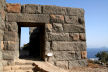 Nisyros - the main entrance to the Paleokastro is about 10 feet (3 metres) from the top step to the lintel.  Individual blocks are about 2 foot in height, 3 feet wide, up to 8 feet long, and are precision cut to bed together without mortar