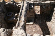 Nisyros - arch carrying water channel over small 'avli' or courtyard in front of a pair of semi-detached one room arched houses built under the terraced fields on the hillside