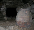 Nisyros - some of the old houses have more than one room going back into the mountainside under field teraces, this one is the middle of 3 rooms looking back towards the entrance to the innermost, a large natural cave going back some 30 metres deep under the fields.