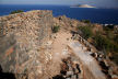 Nisyros - restoration work in progress, showing the construction of the outer walls - parallel walls of large blocks, the gap between filled with stone rubble, the whole about 20 feet thick