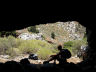 Symi - part way down the steep path from the monastery of Panagia Strateri to the very popular Nanou Bay is a cave ......