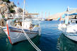 Symi - the harbour is still used by local fishing boats as well as as by the caiques of the well heeled and package tourists from Turkey