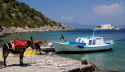 Symi - the fishing quay in Skoumisa Bay is also used by local lads catching octopus - very much a 'living community' not picturesque tourist  - and what a great place to grow up!!! 