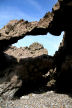 natural arch in the limestone fringing the beach