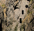 rock and walled cave, Culver Hole, Gower coast