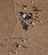 high water mark and mini-flotsam after calm seas, Gower coast