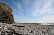 the large expanse of wave-cut platform is soon covered by rapidly rising tide