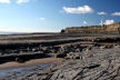 rock and sand foreshore looking West towards Nash Point lighthouses