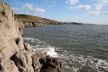 looking East along the limestone cliffs as far as Nash Point in the far distance