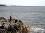 the low cliff tops are popular with fishermen around high tide