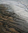 incoming waves and sand-covered wave-cut platform, Glamorgan Heritage Coast